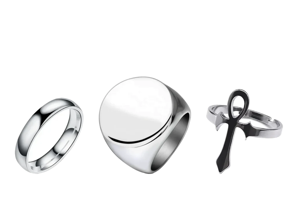 A thin polished band, a round signet ring and an open ankh ring, in stainless steel