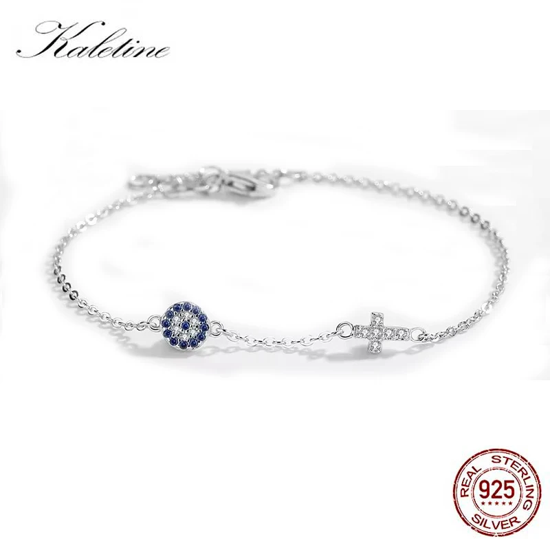 Sterling silver evil eye bracelet with cross