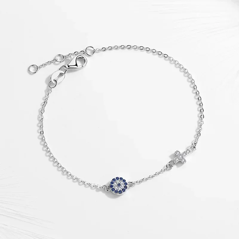 Sterling silver evil eye bracelet with cross