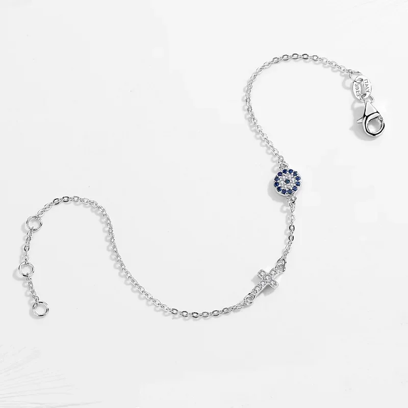 Sterling silver evil eye bracelet with cross