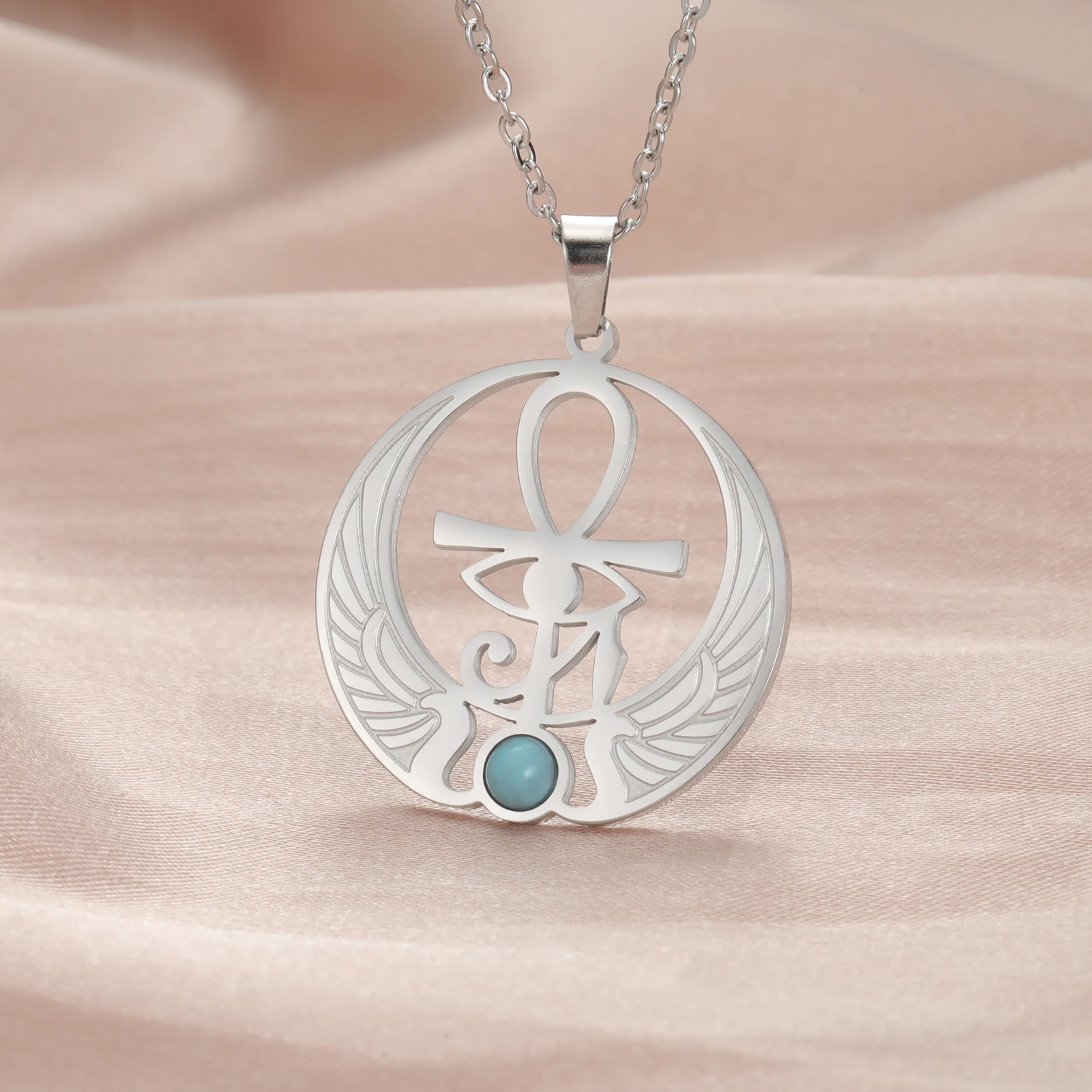 Winged ankh pendant with blue stone